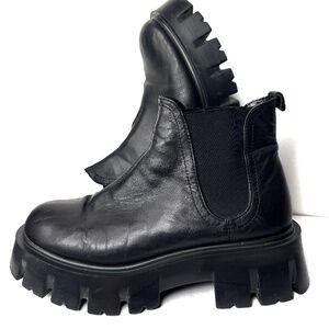 Black leather boots with a rough platform size 38